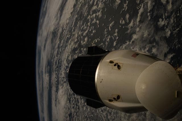NASA image: A SpaceX Dragon spacecraft docked to the International Space Station