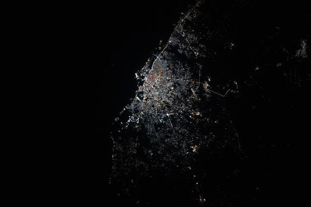 NASA image: Benghazi, Libya, shines with bright, modern city lights on the Mediterranean coastline