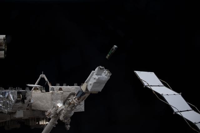 NASA image: A trio of CubeSats is deployed into Earth orbit outside of the International Space Station