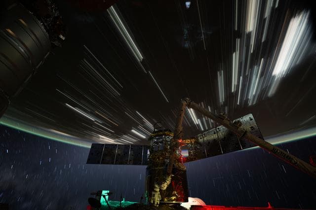 NASA image: Star trails and city lights streak above the China–Mongolia border