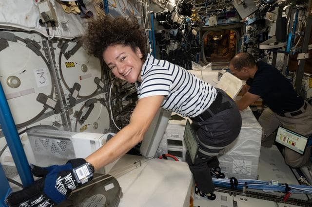 NASA image: NASA astronauts Jessica Meir and Chris Williams collect frozen research samples