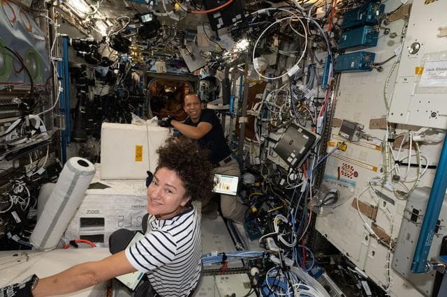 NASA image: NASA astronauts Jessica Meir and Chris Williams collect frozen research samples