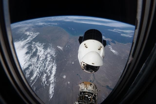 NASA image: A SpaceX Dragon spacecraft backs away from the International Space Station