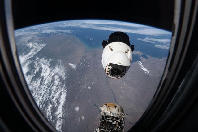 NASA image: A SpaceX Dragon spacecraft backs away from the International Space Station