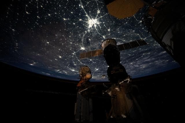 NASA image: The well‑lit nighttime cityscape of the Indian subcontinent