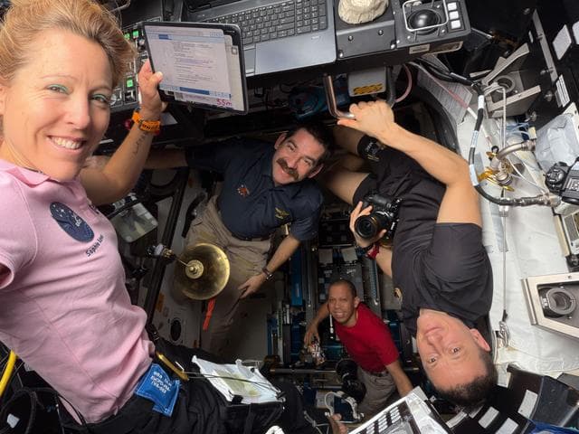 NASA image: Expedition 74 crew members for a portrait together inside the International Space Station