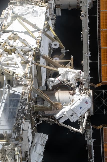 NASA image: NASA astronauts Jessica Meir and Chris Williams are pictured during a spacewalk