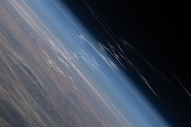 NASA image: The exhaust plume left behind by Artemis II is pictured from the International Space Station