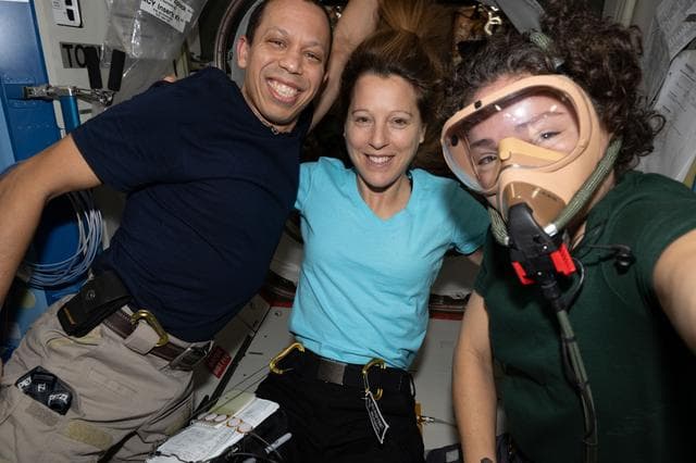 NASA image: Astronauts Chris Williams, Sophie Adenot, and Jessica Meir pose for a portrait