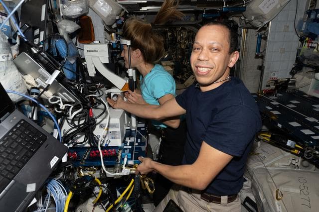 NASA image: NASA astronaut Chris Williams guides ESA astronaut Sophie Adenot during an eye exam