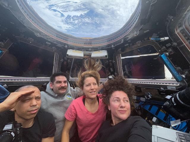 NASA image: Expedition 74 flight engineers waiting to observe the plasma trail of the Orion spacecraft