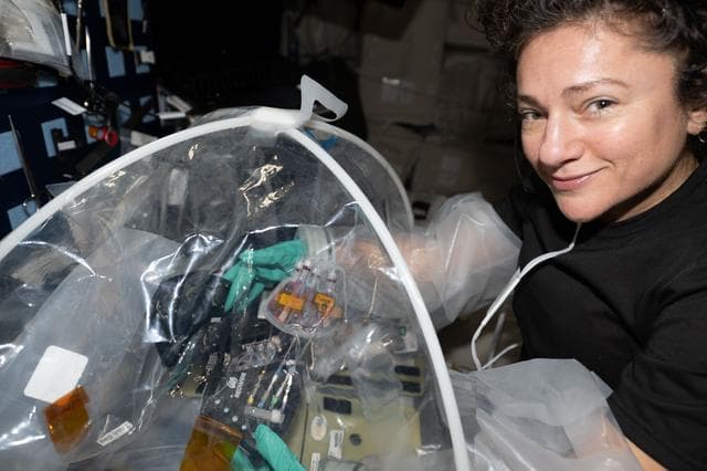 NASA image: NASA astronaut Jessica Meir configures research hardware for a biotechnology investigation