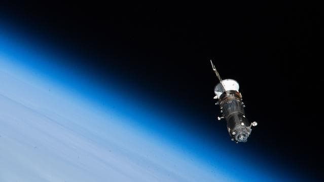 NASA image: The trash-packed Progress 93 cargo spacecraft departs the International Space Station