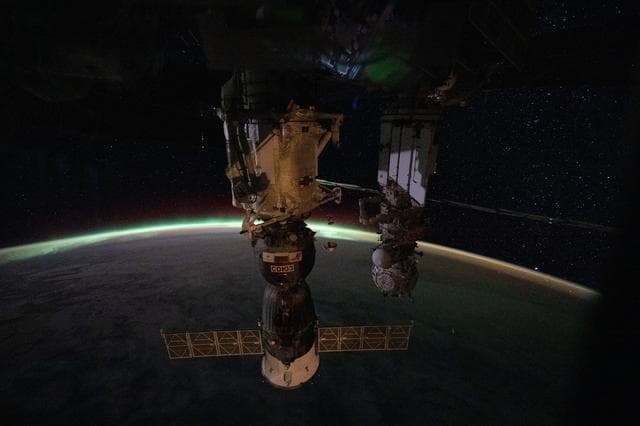 NASA image: The aurora australis arcs above Earth’s horizon