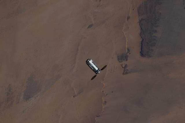NASA image: The Cygnus XL cargo spacecraft approaches the International Space Station above the Sahara
