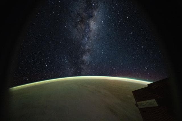 NASA image: The Milky Way rises above Earth's atmospheric glow