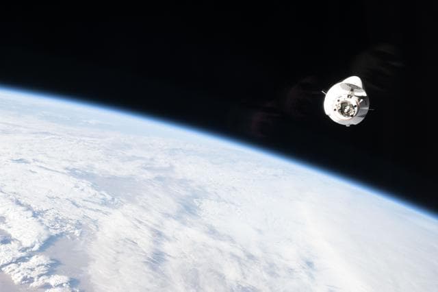 NASA image: A SpaceX Dragon cargo spacecraft approaches the International Space Station