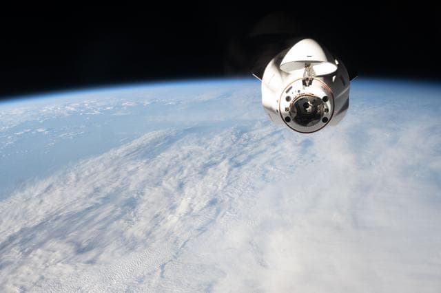 NASA image: A SpaceX Dragon cargo spacecraft approaches the International Space Station