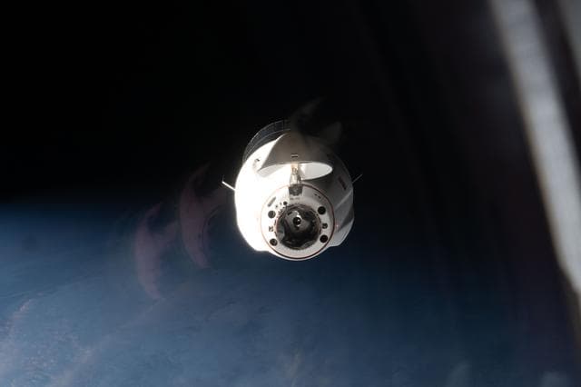 NASA image: A SpaceX Dragon cargo spacecraft approaches the International Space Station