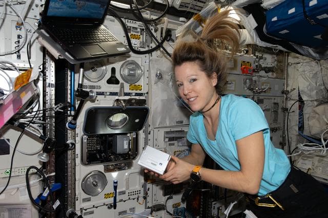 NASA image: ESA astronaut Sophie Adenot prepares to install new research hardware in the BioLab facility