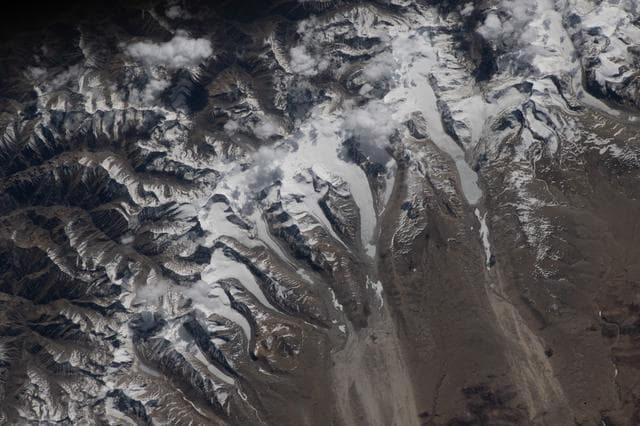 NASA image: Glaciers flow downhill from the Himalayas’ northern slopes onto China's Tibetan Plateau