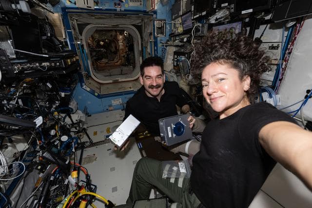 NASA image: NASA astronauts Jack Hathaway and Jessica Meir pose together for a portrait during research activities