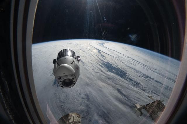 NASA image: A SpaceX Dragon cargo spacecraft backs away from the International Space Station
