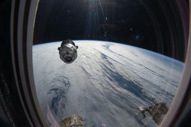 NASA image: A SpaceX Dragon cargo spacecraft backs away from the International Space Station