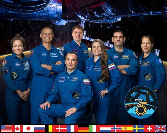 NASA image: The official portrait of the seven‑member Expedition 75 crew
