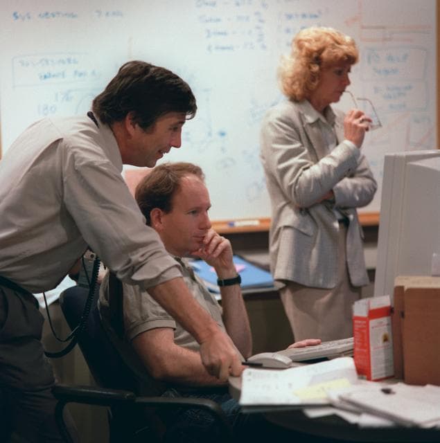 NASA image: Michael Kobrick and Scott Vangen on console in CIC