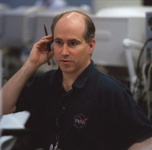 NASA image: Michael Kobrick and Scott Vangen on console in CIC