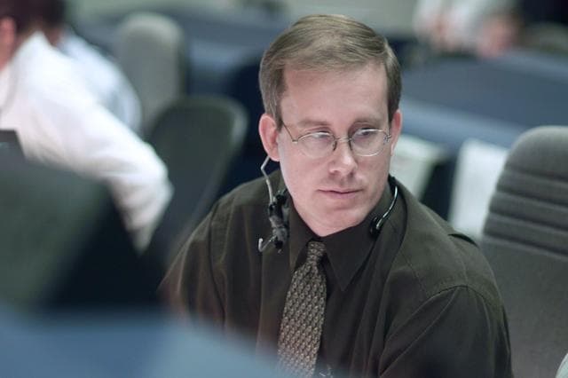 NASA image: STS-105 coverage of Mission Control Center employees in the WFCR & BFCR