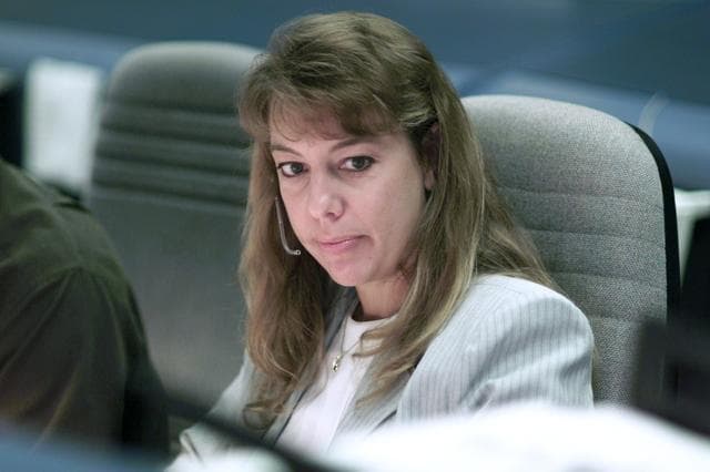 NASA image: STS-105 coverage of Mission Control Center employees in the WFCR & BFCR