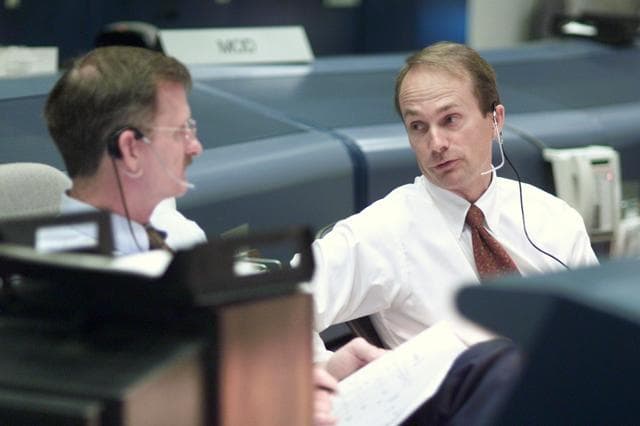 NASA image: STS-105 coverage of Mission Control Center employees in the WFCR & BFCR
