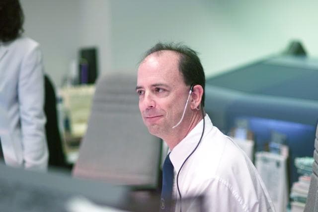 NASA image: STS-105 coverage of Mission Control Center employees in the WFCR & BFCR