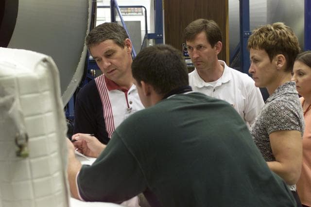 NASA image: Expedition 5 crewmembers performing EVA Tool Configuration Training in the SVMF