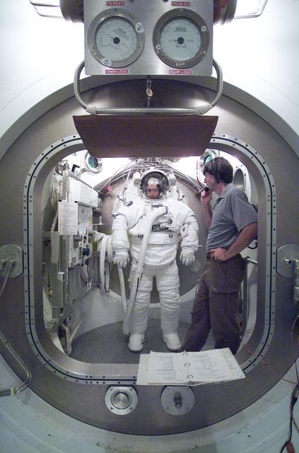 NASA image: Expedition Six Crew Training: Donald Pettit EMU Suit Training in SSATA Chamber