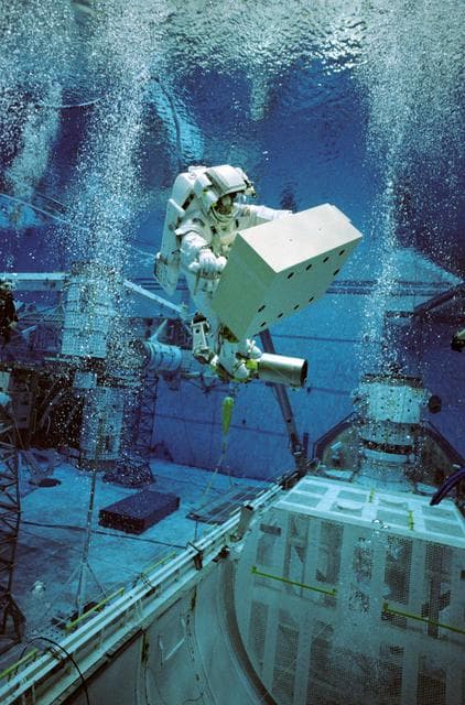 NASA image: Photographic coverage STS-116 crew training underwater in the NBL.