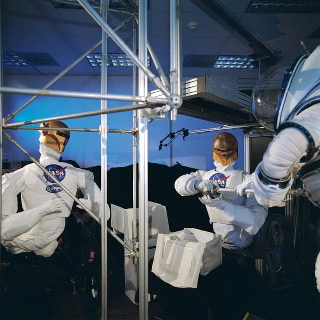 NASA image: Robonaut activities involving joint task operations with a EVA suited astronaut