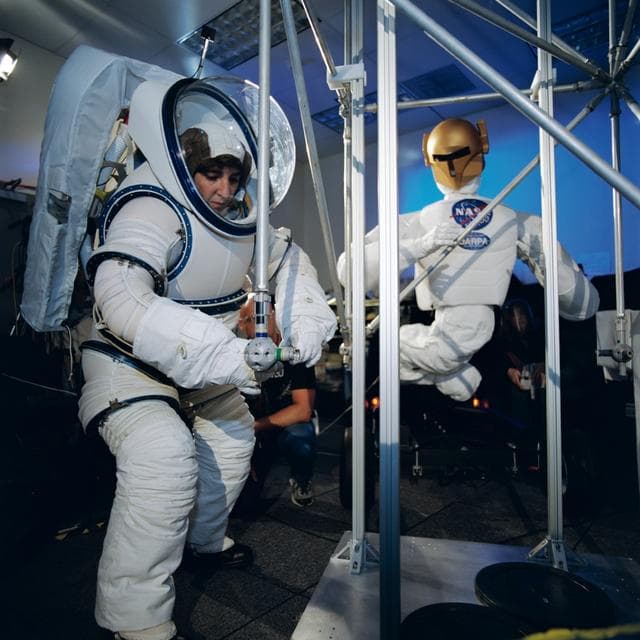 NASA image: Robonaut activities involving joint task operations with a EVA suited astronaut