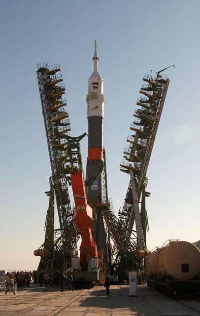 NASA image: Soyuz TMA-3 and booster rocket transport and raise on launch pad at Baikonur Cosmodrome