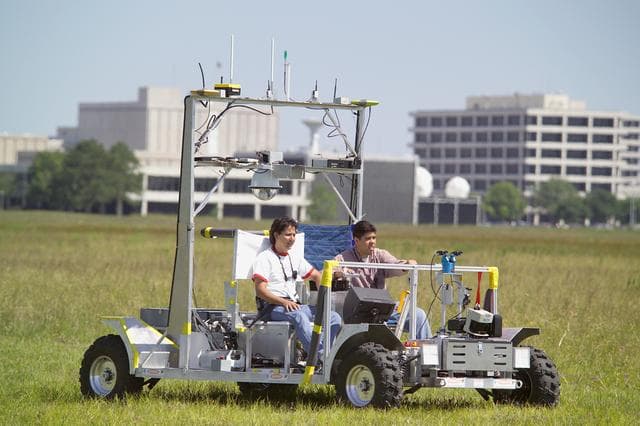 NASA image: JSC Features - SCOUT Rover testing with Advanced EVA Suit on JSC Fields