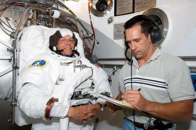 NASA image: Crew Station Airlock Training, STS-116, SSATA Chamber