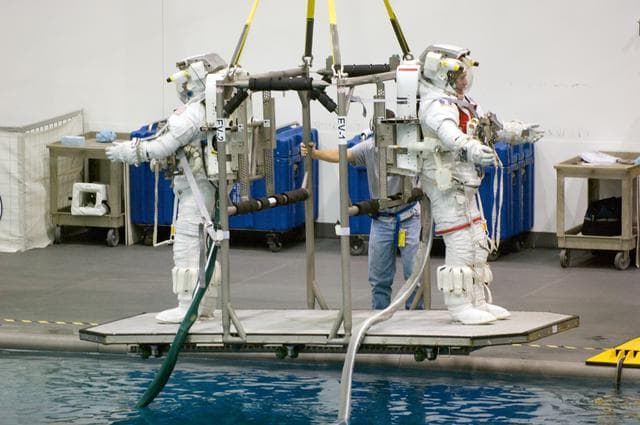 NASA image: STS-117 Crew during an EVA 3 Run at the NBL