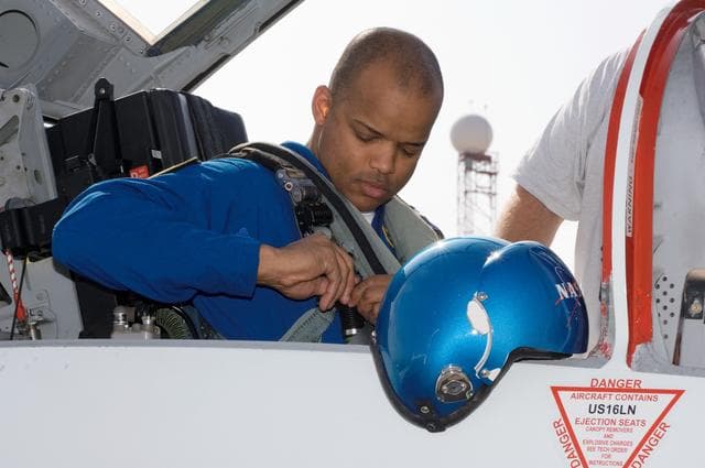 NASA image: The crew of STS-116 leave from Ellington Field for KSC for prelaunch training
