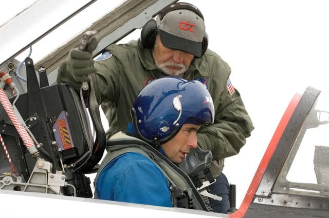 NASA image: STS-117 crew members Frederick Sturckow and Lee Archambault leaving in T-38
