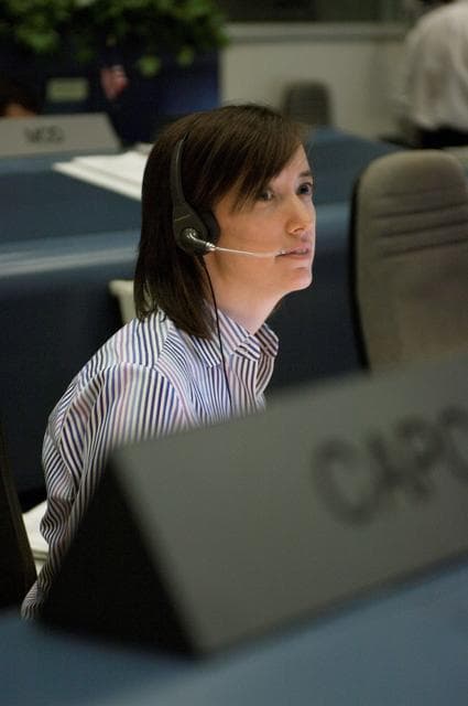 NASA image: STS-116 Flight Controllers on console during mission - STS-116 Orbit 2