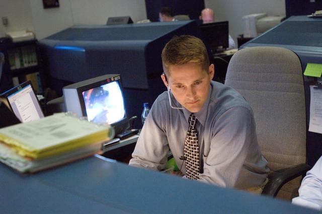 NASA image: STS-118 Flight Controllers on console during mission - (Ascent Team) - (WFCR)