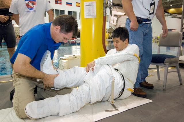 NASA image: STS-120 crew during NBL training with Dan Tani
