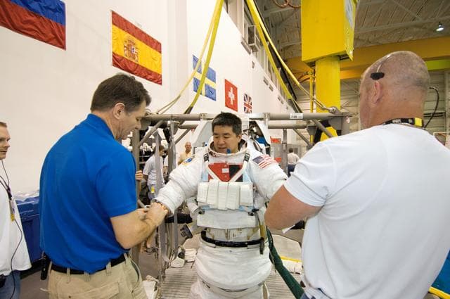 NASA image: STS-120 crew during NBL training with Dan Tani